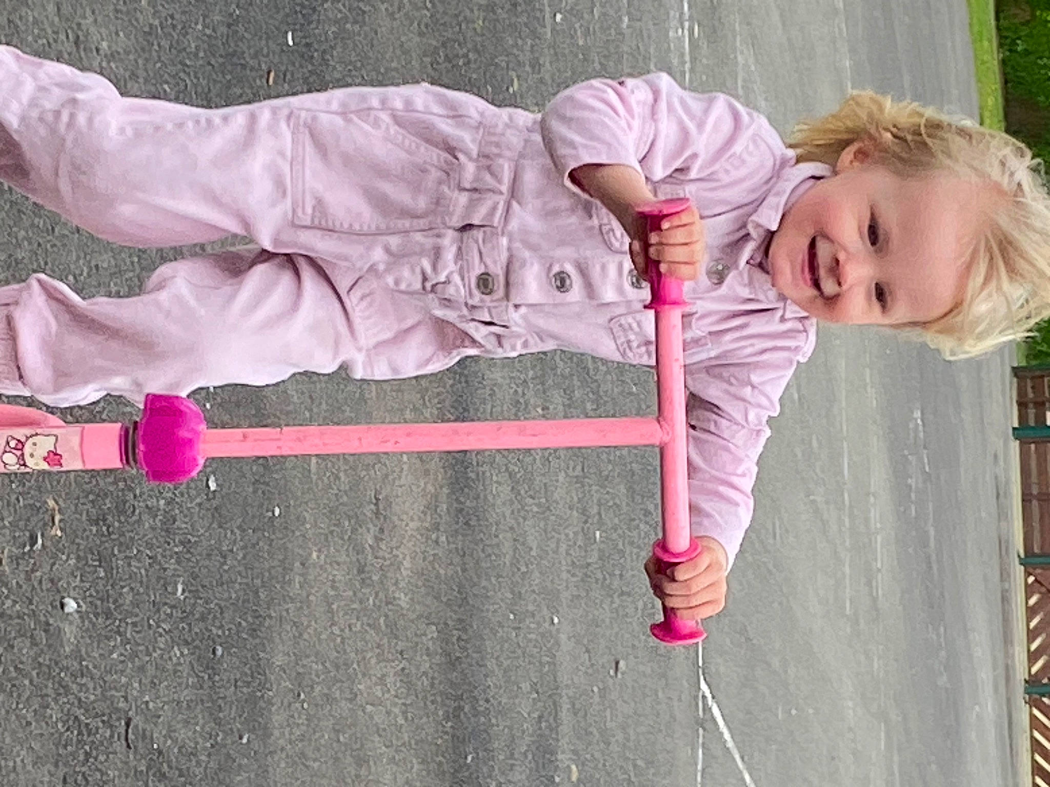 Christiane participe au concours pour gagner de l'argent avec cette photo : baby, baby_toddler_clothing, child, fun, grass, happy, head, jacket, joy, knee, leisure, magenta, person, pink, plant, recreation, shoe, sitting, smile, sneakers