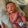 Freddie is registered to the contest to win money with this photo: newborn, baby, infant, diaper, blanket, hand, skin, feet, toes, fingers, person, resting, indoors, soft, texture, support, curious, small, cute, naked