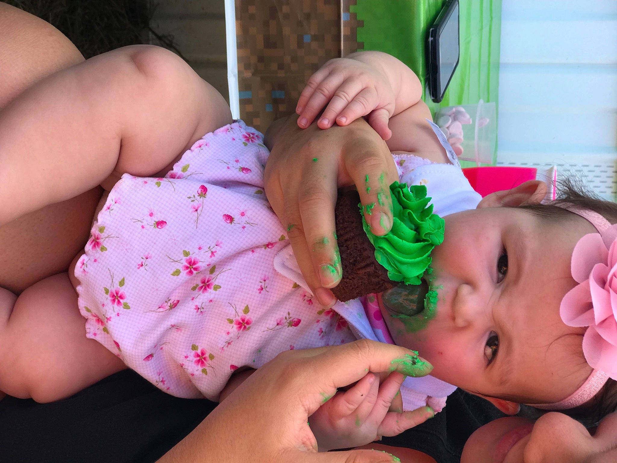 Gabriella joined the competition — help win amazing prizes! arm, baby, baby_toddler_clothing, cheek, child, ear, eyelash, finger, gesture, green, hand, happy, human_body, lip, mouth, nail, nose, person, pink, skin