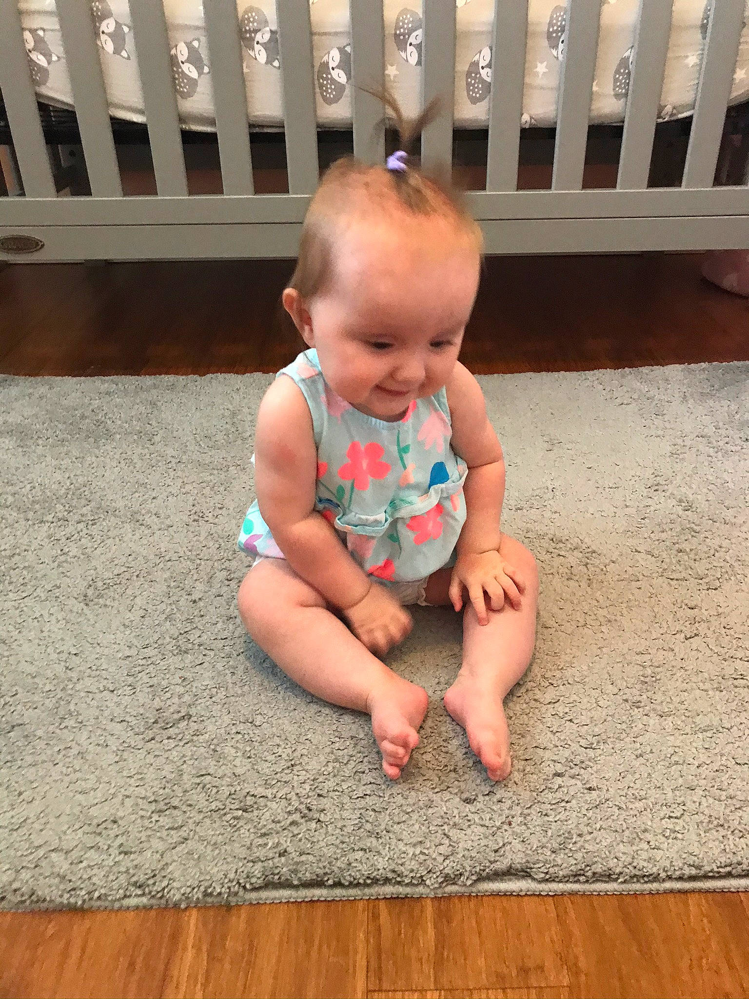 Adelaide joined the competition — help win amazing prizes! baby, baby_toddler_clothing, child, floor, flooring, foot, grass, happy, hardwood, human_leg, leisure, pattern, person, sitting, skin, smile, toddler, varnish, white, wood