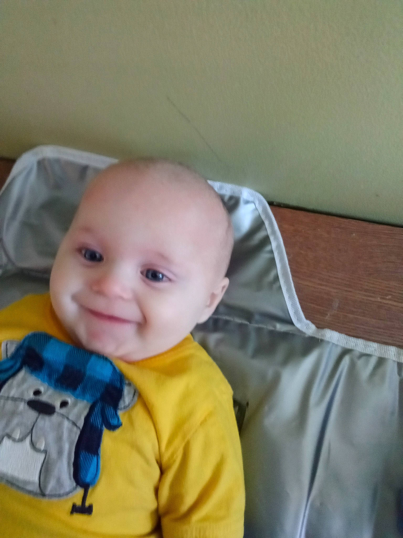 Chase is registered to the contest to win money with this photo: baby, baby_products, baby_toddler_clothing, cheek, child, comfort, eye, eyebrow, eyelash, hair, happy, human_body, iris, joy, linens, mouth, nose, person, room, sleeve