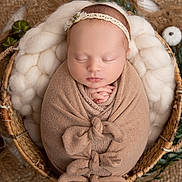 Alba participe au concours pour gagner de l'argent avec cette photo : newborn, baby, sleeping, swaddled, basket, blanket, headband, cozy, soft, peaceful, infant, wrapped, cute, portrait, closeup, hands, decor, natural, warm, resting