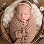 newborn, baby, sleeping, swaddled, basket, blanket, headband, cozy, soft, peaceful, infant, wrapped, cute, portrait, closeup, hands, decor, natural, warm, resting