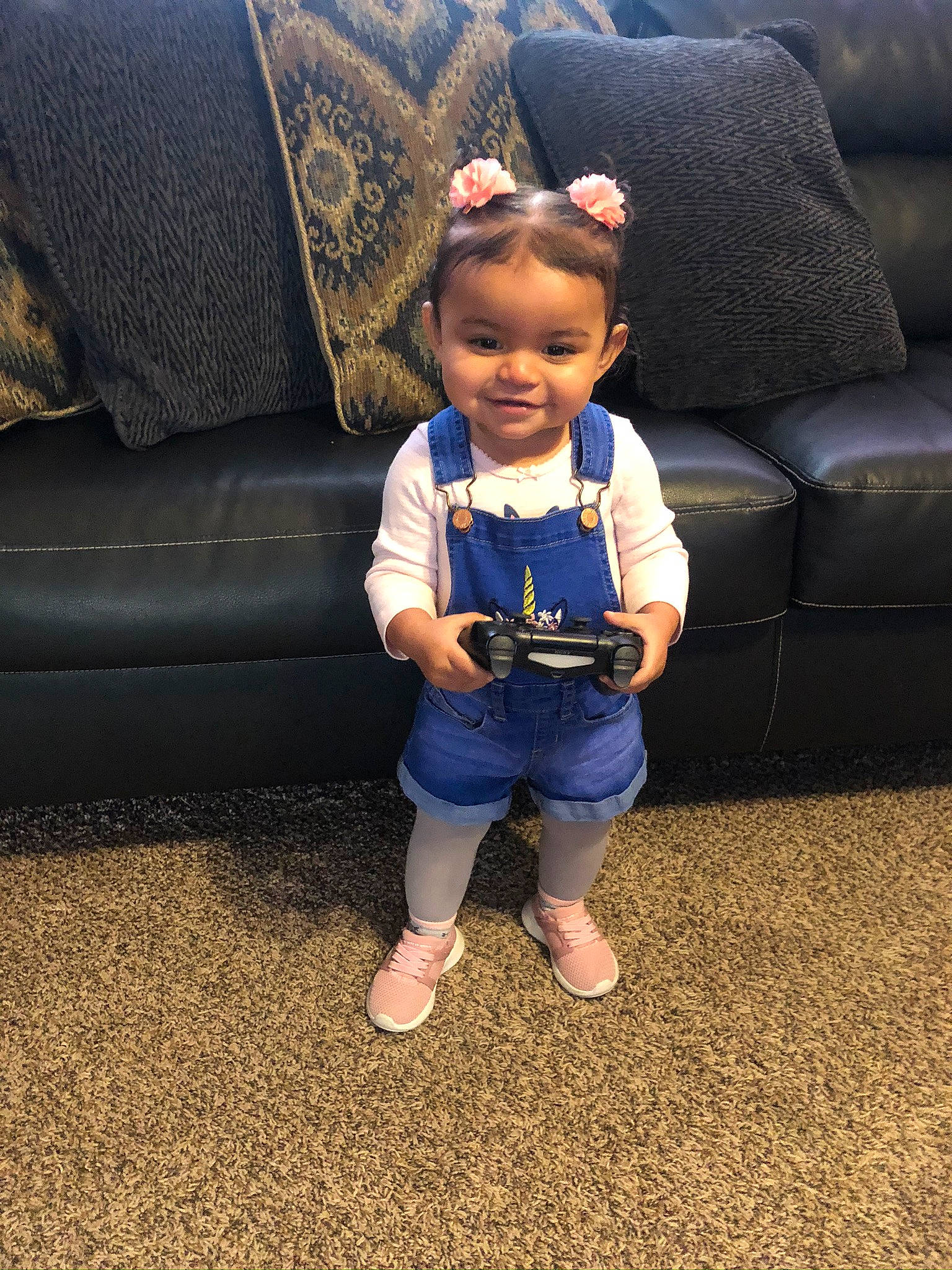 Gabby is registered to the contest to win money with this photo: baby, child, floor, flooring, fun, joy, leg, person, shoe, sitting, skin, smile, toddler, vacation
