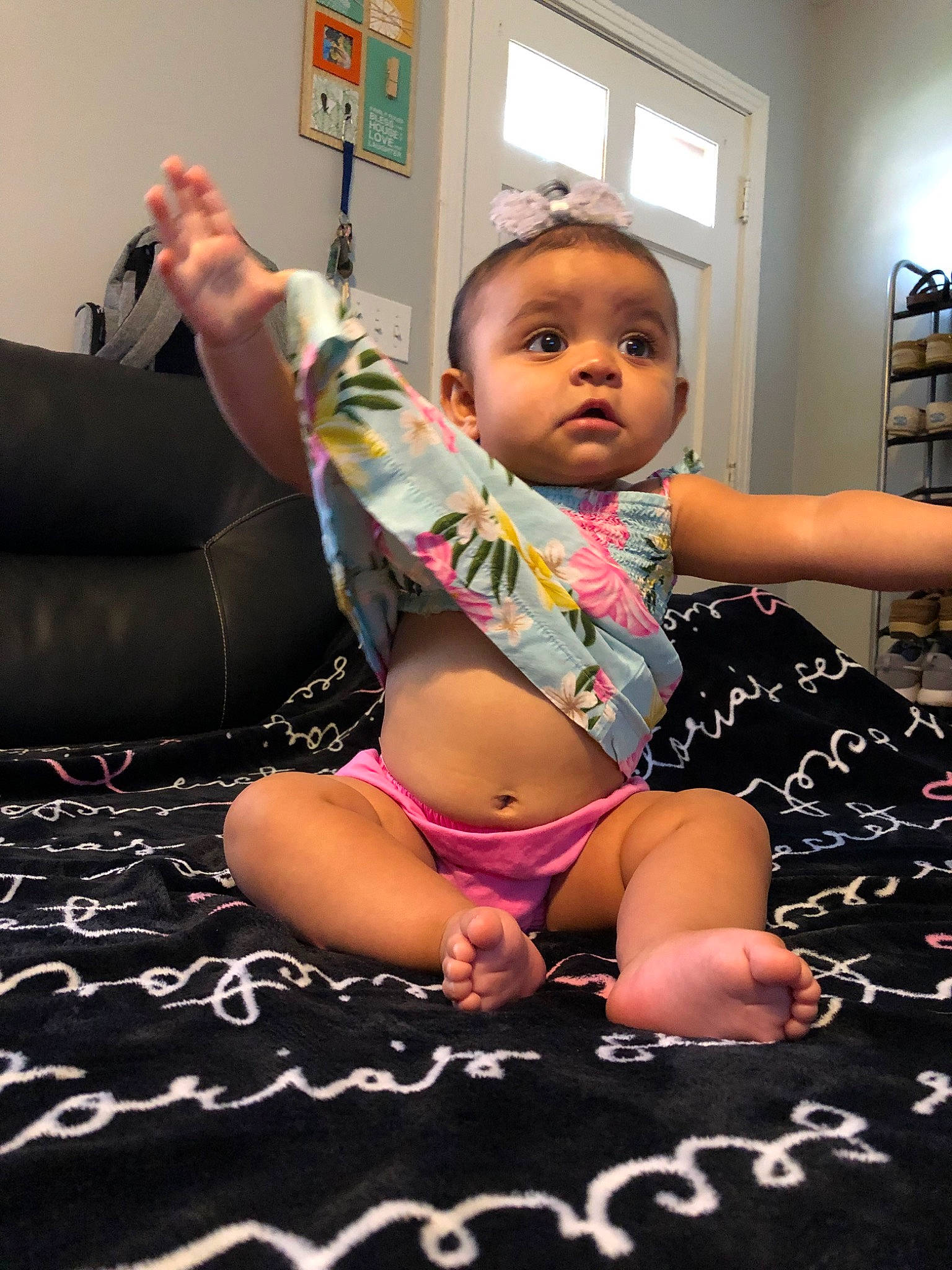 Gabby joined the competition — help win amazing prizes! abdomen, arm, baby, barefoot, cheek, child, finger, foot, head, human_body, joint, leg, muscle, navel, person, pink, sitting, skin, stomach, toddler
