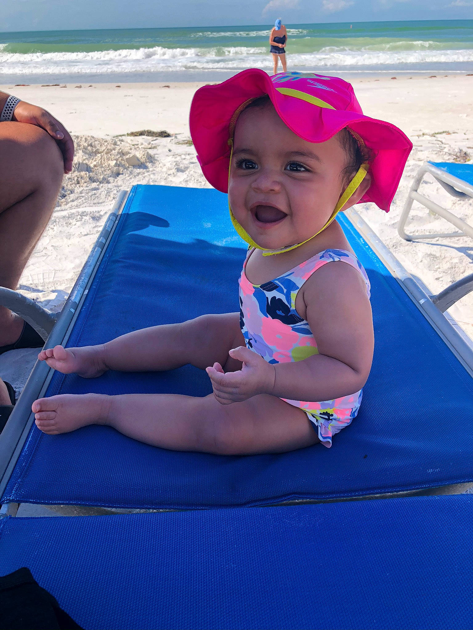 Gabby is registered to the contest to win money with this photo: beach, blue, cap, child, electric_blue, fun, hat, headgear, headwear, joy, leisure, ocean, person, recreation, sand, sea, smile, summer, sun_hat, sun_tanning