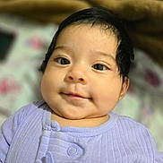 Zoe joined the competition — help win amazing prizes! adorable, baby, bed, blanket, cheeks, closeup, dark_hair, eyes, face, happy, infant, looking_at_camera, lying_down, onesie, portrait, purple_clothing, skin, smile, soft_lighting, zipper