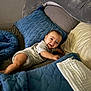 Josiah is registered to the contest to win money with this photo: baby, smiling, bed, blanket, pillow, indoor, child, happy, infant, clothing, person, comfort, relaxation, soft, cushion, face, lying_down, cute, young, home