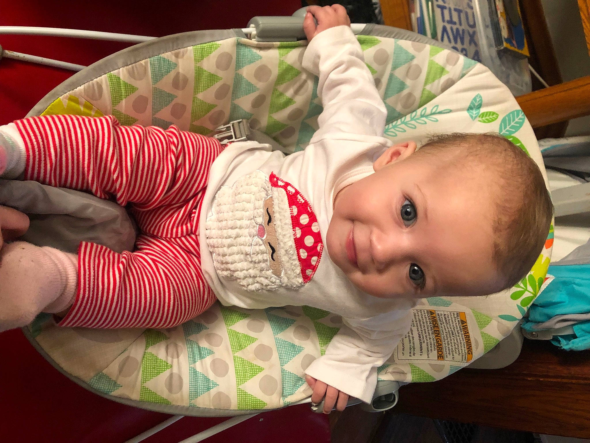 Karlee joined the competition — help win amazing prizes! baby, baby_products, baby_safety, baby_toddler_clothing, carmine, cheek, child, comfort, mammal, pattern, person, room, sitting, skin, sleeve, sock, toddler, wood