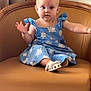 Kelyana a rejoint le concours — aidez-le/la à gagner de superbes lots ! baby, child, blue_dress, sitting, chair, leather, curious, expression, white_shoes, necklace, indoor, portrait, furniture, person, young_child, cute, fashion, neutral_background, skin, head