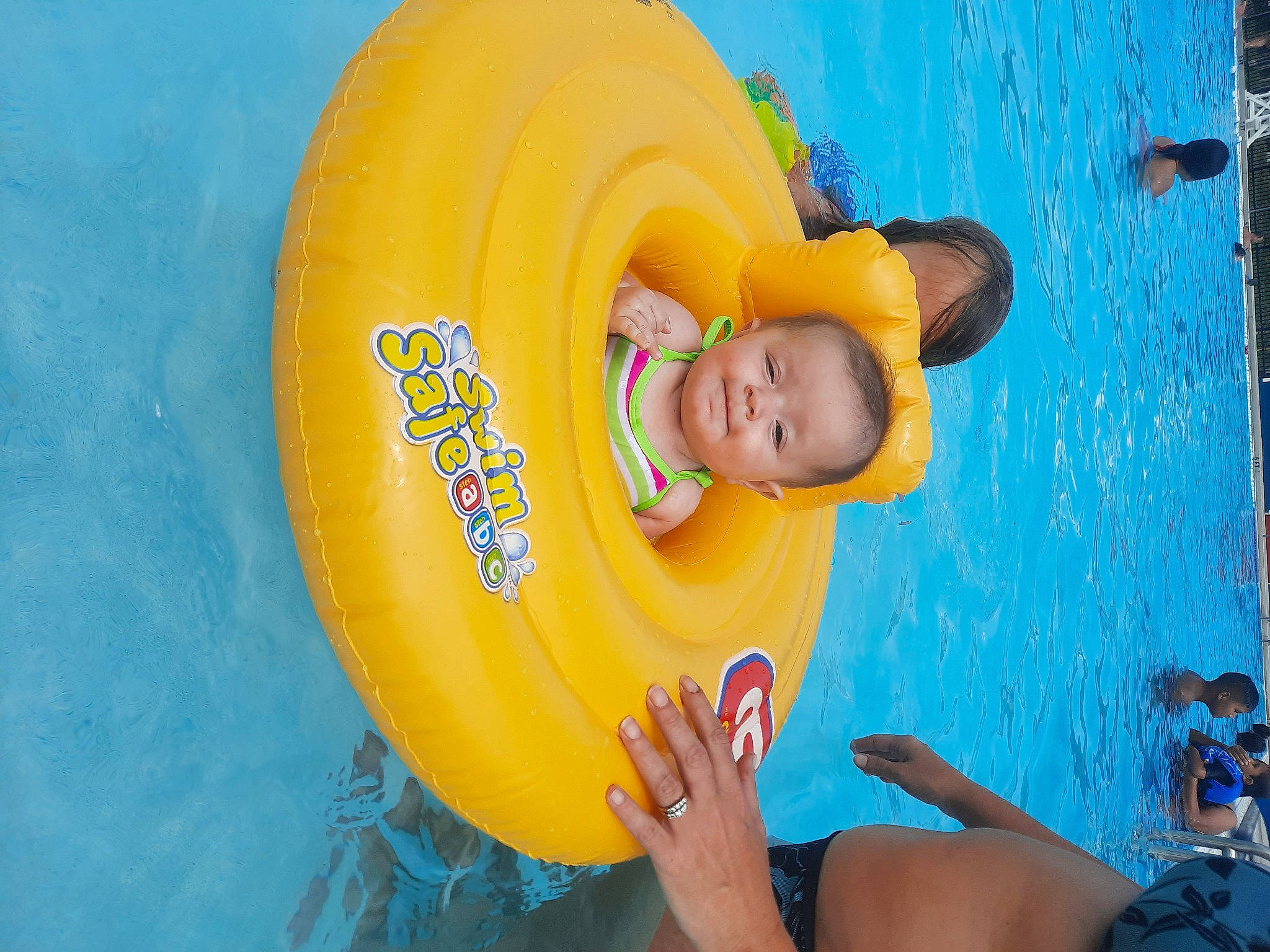 Harmony joined the competition — help win amazing prizes! aqua, blue, child, fun, games, happy, hat, headgear, inflatable, leisure, outdoor_play_equipment, paint, person, personal_protective_equipment, play, recreation, sun_hat, swimming_pool, toddler, water