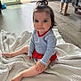 toddler, child, baby, indoor, blanket, floor, striped_clothing, red_skirt, pony_tail, barefoot, wooden_floor, window, daylight, person, standing, sitting, home, casual_clothing, cute, portrait