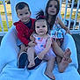 child, children, baby, sitting, chair, outdoor, smiling, family, shoe, dress, red_hoodie, blue_sky, railing, deck, grass, car, happy, cute, portrait, playful