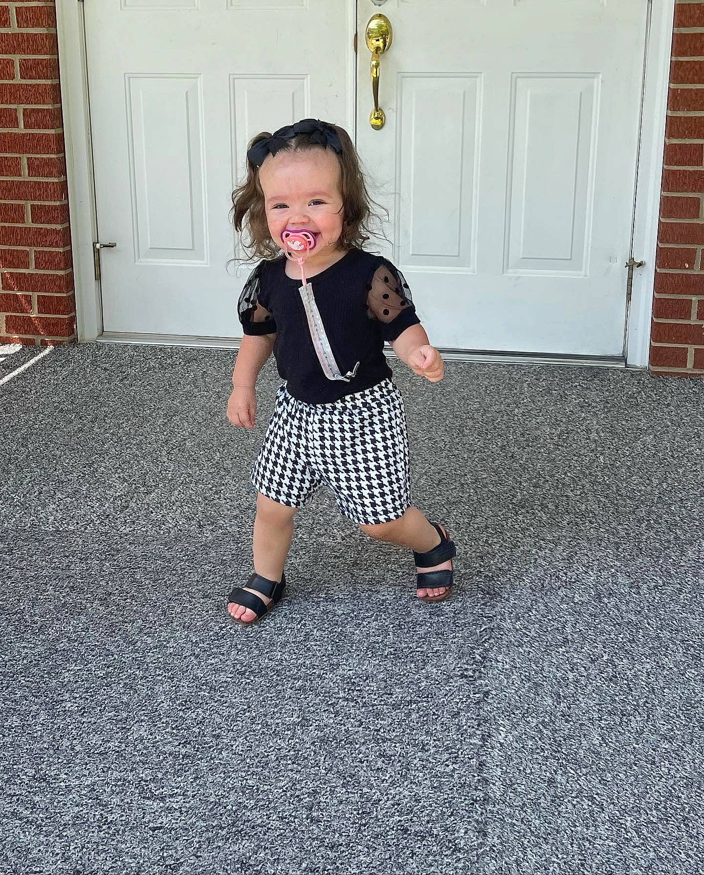 Tatum joined the competition — help win amazing prizes! baby_toddler_clothing, child, day_dress, door, dress, floor, flooring, foot, home_door, human_leg, joint, joy, knee, pattern, person, plaid, road_surface, sitting, sleeve, smile