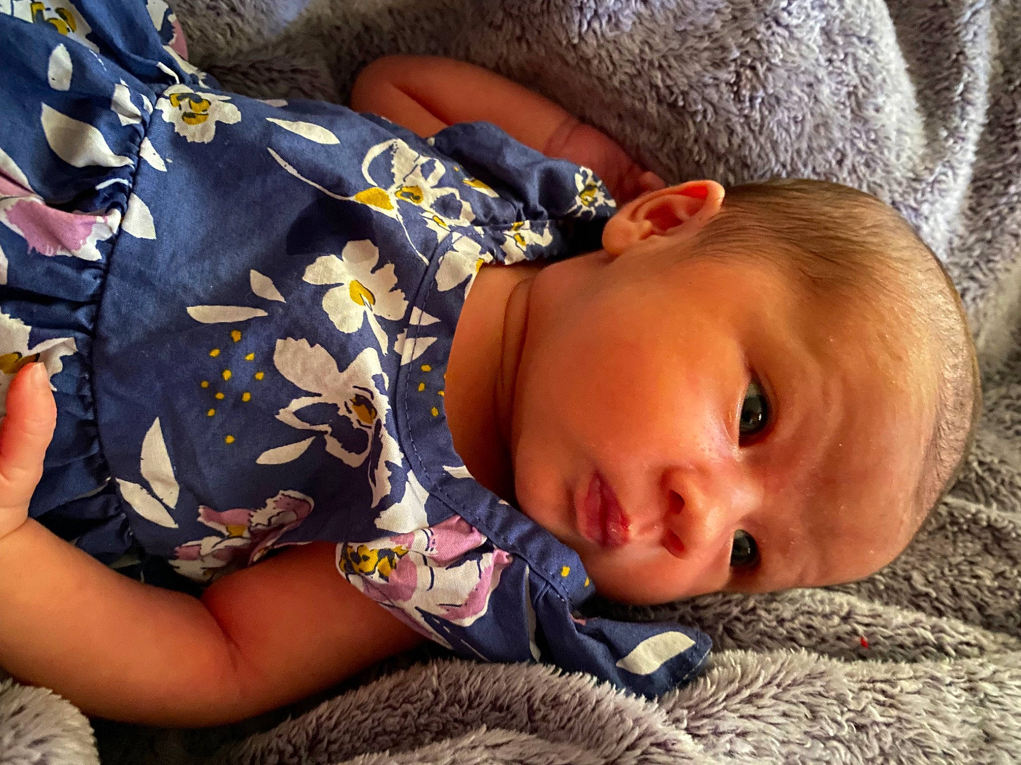 Estelle joined the competition — help win amazing prizes! baby, baby_toddler_clothing, bedtime, cheek, child, comfort, eye, finger, grass, happy, head, human_body, iris, linens, lip, mouth, nose, person, skin, toddler