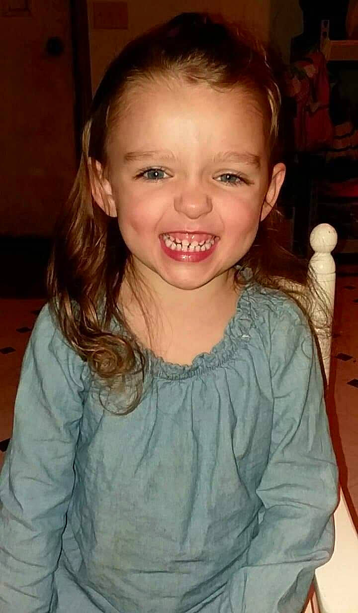 Cynthia is registered to the contest to win money with this photo: brown_hair, cheek, child, child_model, chin, eye, eyebrow, face, facial_expression, forehead, fun, hair, hairstyle, iris, jaw, joy, long_hair, nose, organ, person