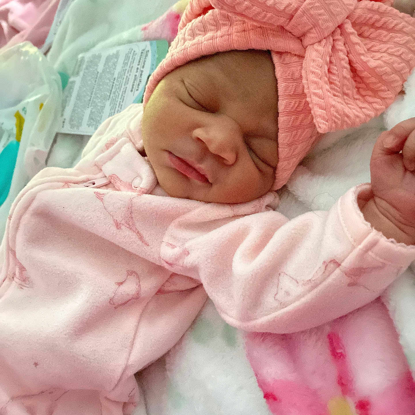 Leilani is registered to the contest to win money with this photo: architecture, baby, bed, blanket, bonnet, building, clothing, face, furniture, glove, hat, head, hospital, newborn, person, photography, portrait, quilt, sleeping, towel