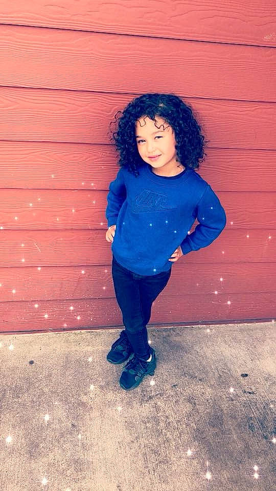 Lillyana is registered to the contest to win money with this photo: black_hair, blue, child, clothing, cool, day, electric_blue, footwear, fun, girl, jeans, joy, outerwear, person, photograph, pink, purple, red, shoulder, sitting