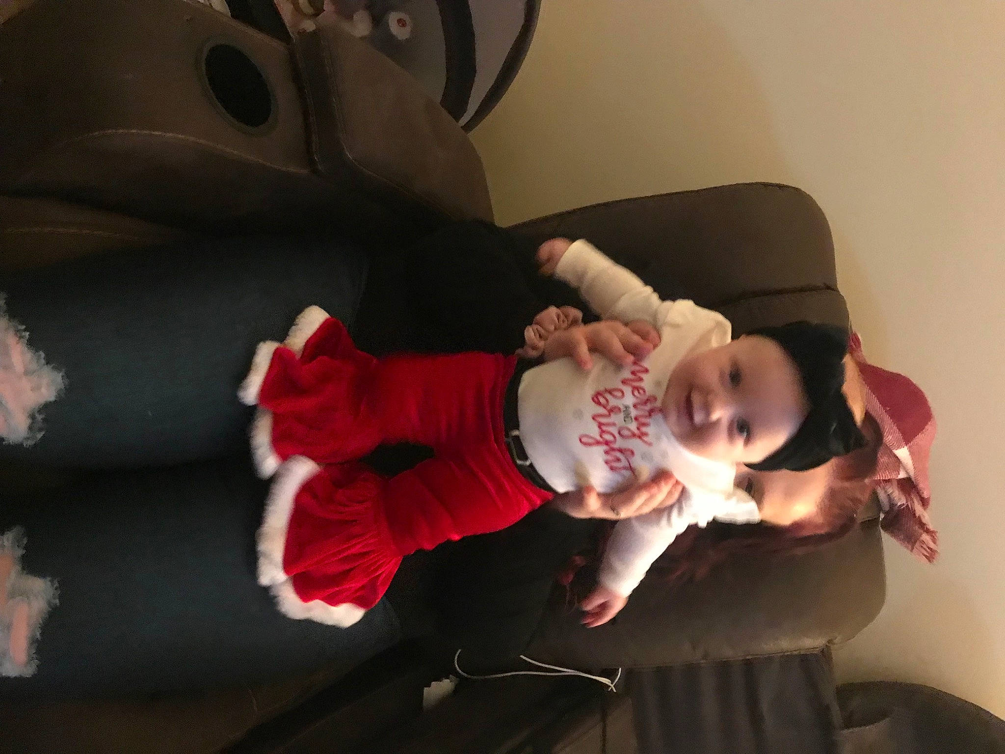 Amelia joined the competition — help win amazing prizes! baby, baby_products, baby_toddler_clothing, carmine, child, comfort, event, flooring, fun, happy, knee, lap, lighting_accessory, person, room, sitting, smile, sock, toddler, wood