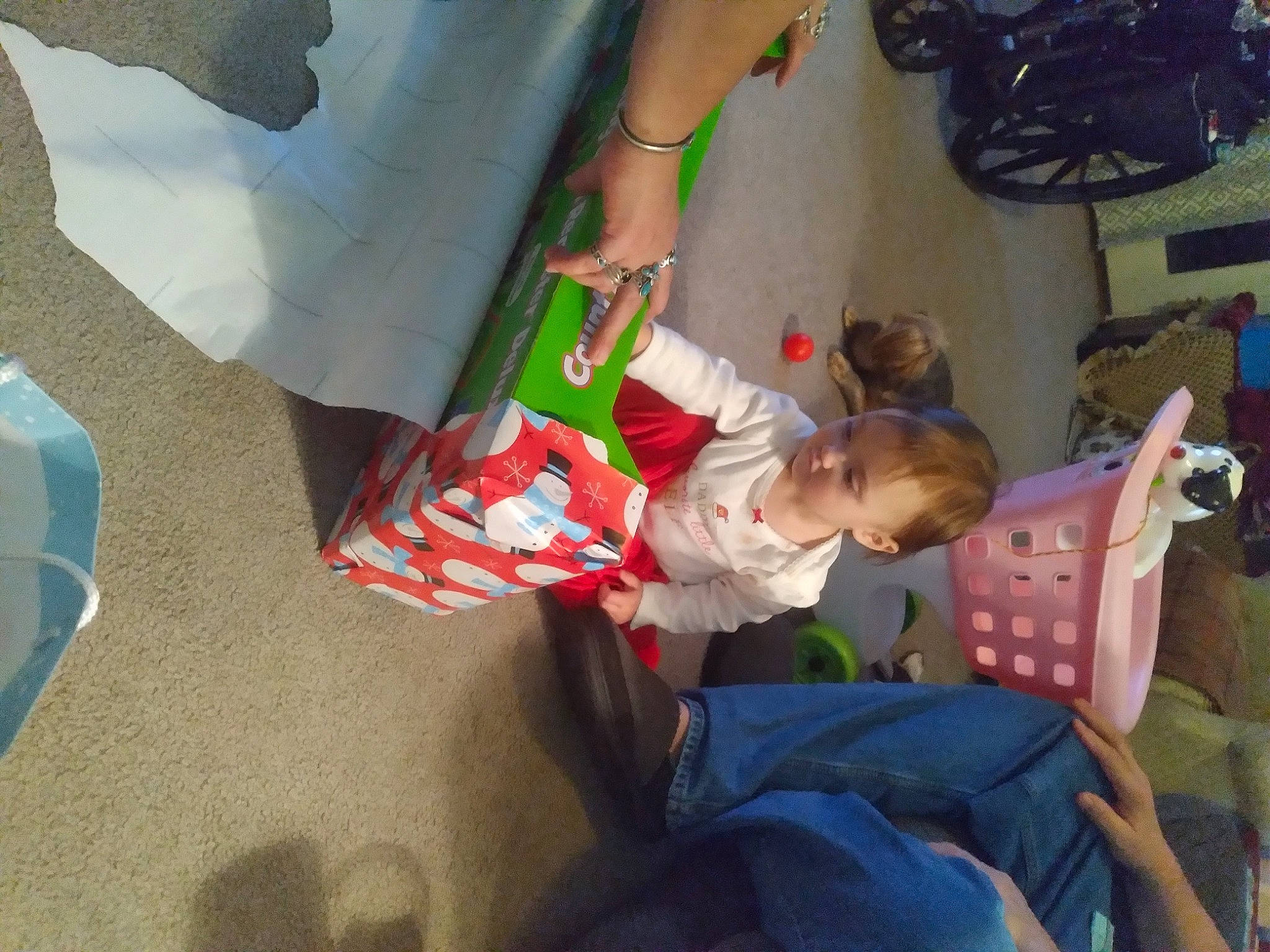 Sarri is registered to the contest to win money with this photo: baby, child, event, foot, fun, holiday, human_leg, lap, leisure, luggage_and_bags, person, play, room, sitting, sock, textile, tire, toddler, tree, vacation