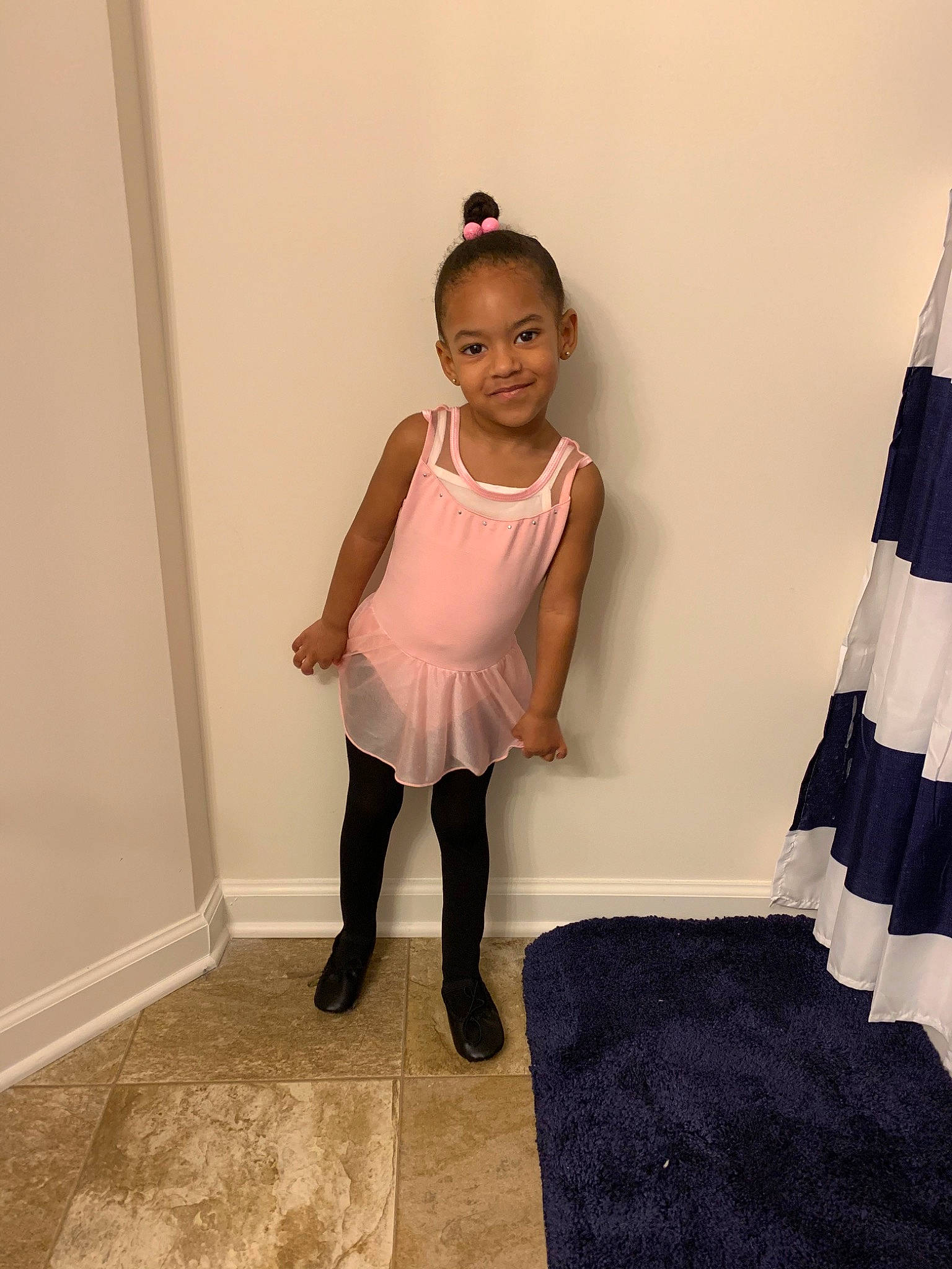 Amariana is registered to the contest to win money with this photo: child, clothing, dress, footwear, joint, joy, knee, leg, person, pink, room, shoe, shoulder, tights, toddler