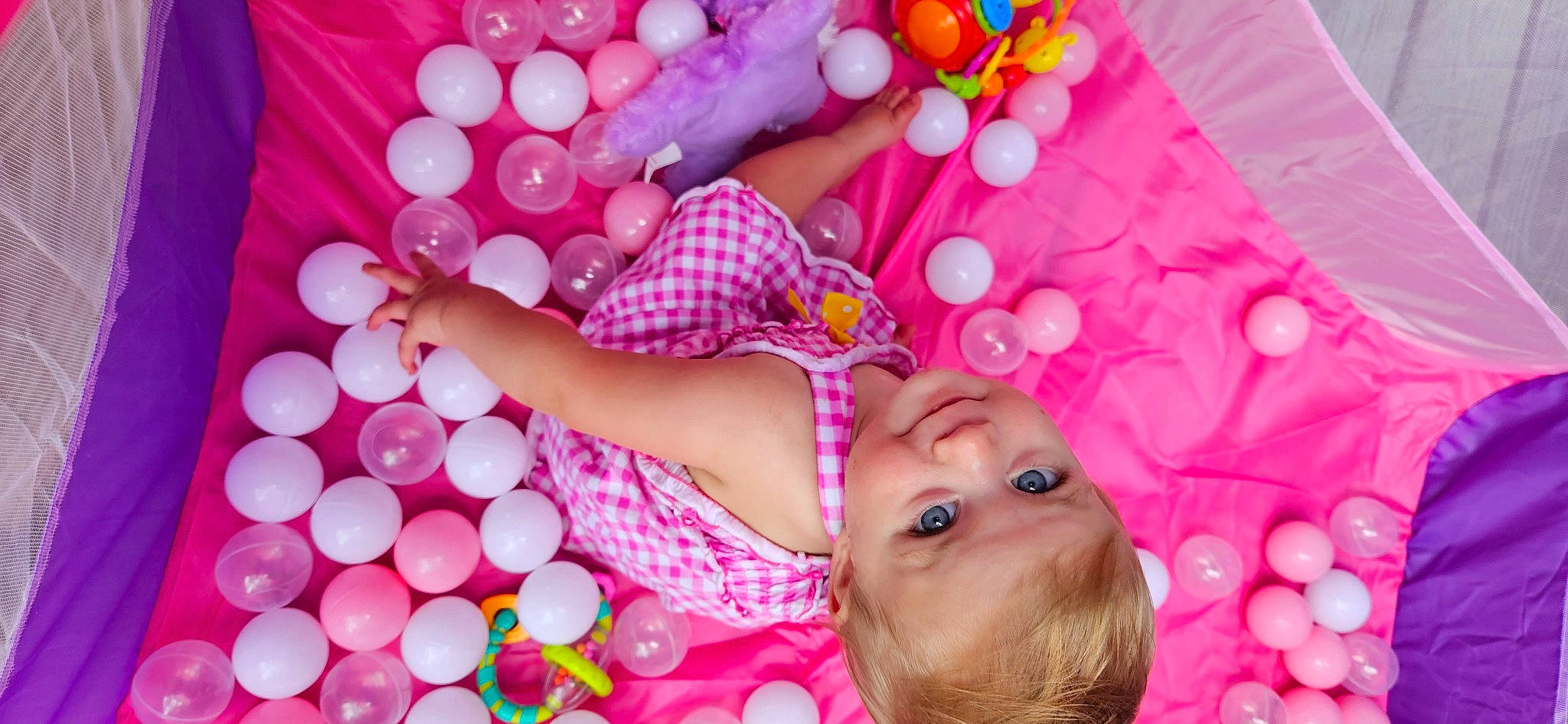 Miracle is registered to the contest to win money with this photo: baby, baby_toddler_clothing, balloon, beauty, cheek, child, circle, event, fun, happy, joy, magenta, nail, party_supply, pattern, peach, person, pink, play, product