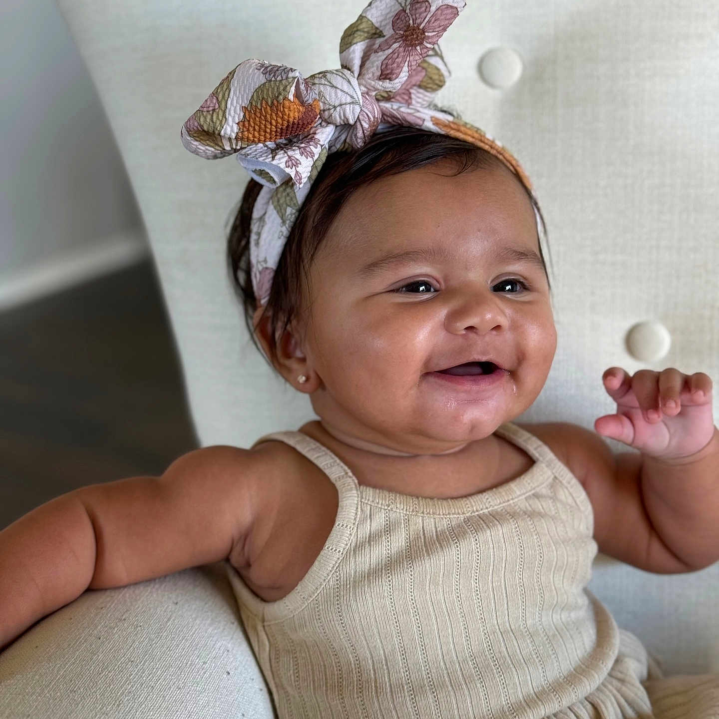 Kaliah is registered to the contest to win money with this photo: accessories, baby, bodypart, clothing, couch, dress, face, finger, furniture, hand, happy, hat, head, homedecor, jewelry, person, photography, portrait, sitting, smile