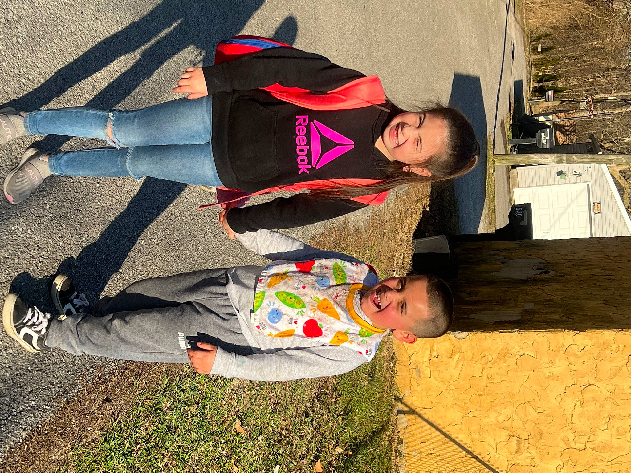 Mariana is registered to the contest to win money with this photo: child, eyewear, fun, grass, happy, human_leg, joy, landscape, leisure, people_in_nature, person, shadow, shoe, sitting, sneakers, soil, thigh, tints_and_shades, travel, tree