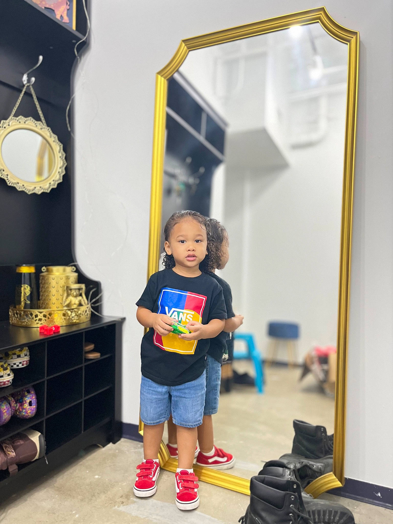 Randall Rj joined the competition — help win amazing prizes! cabinetry, child, drawer, electric_blue, floor, flooring, fun, interior_design, leisure, luggage_and_bags, person, room, shelf, shelving, shoe, shorts, sneakers, standing, t_shirt, toddler
