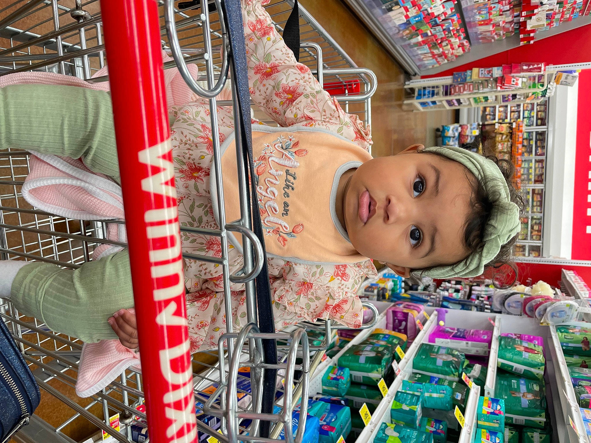 Kaelani is registered to the contest to win money with this photo: building, child, city, convenience_store, customer, fun, grocery_store, leisure, market, marketplace, person, retail, room, selling, service, shelf, shopping, t_shirt, temple, textile