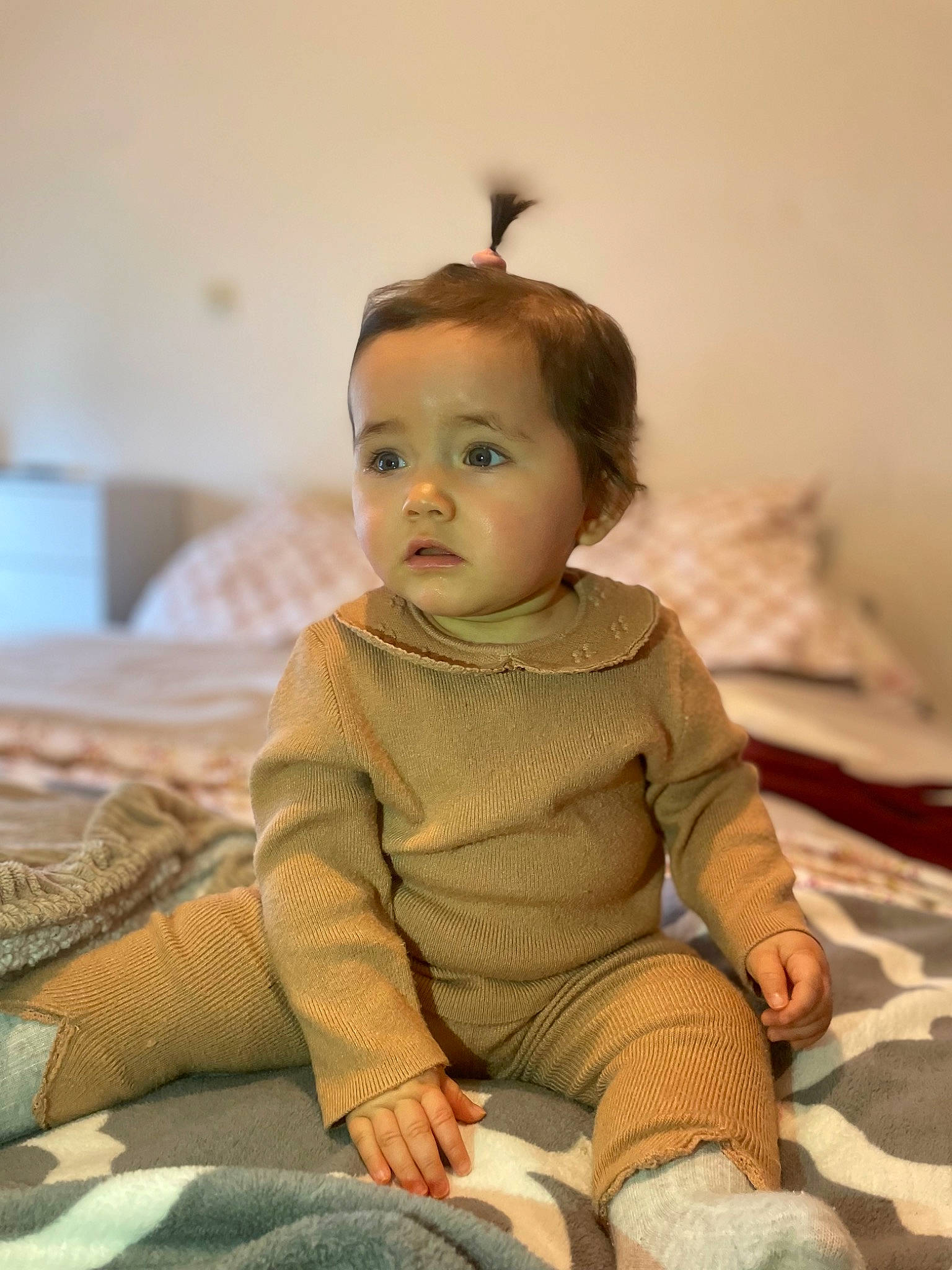 Maliya participe au concours pour gagner de l'argent avec cette photo : baby, baby_toddler_clothing, cheek, chin, comfort, dress, eye, face, floor, flooring, hairstyle, head, human_body, iris, lip, person, skin, sleeve, standing, toddler