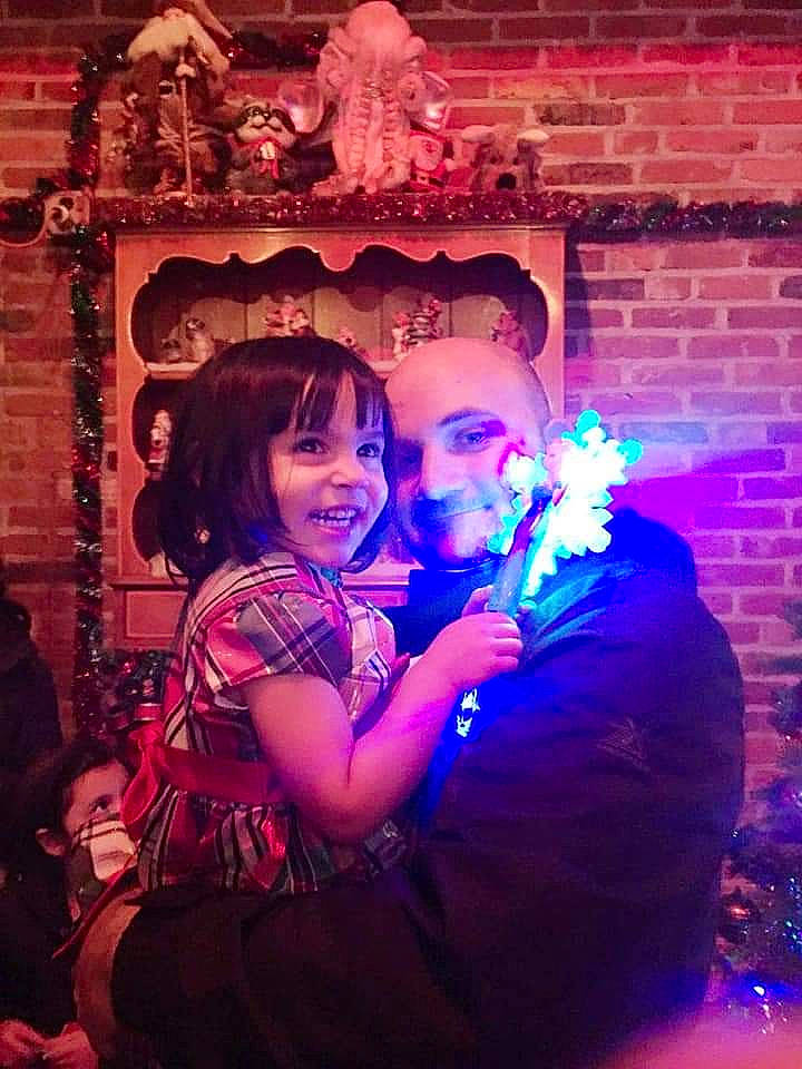 Anya is registered to the contest to win money with this photo: darkness, electric_blue, entertainment, event, flash_photography, flower, fun, happy, joy, leisure, lighting, magenta, performance_art, performing_arts, person, pink, plant, purple, smile, toddler