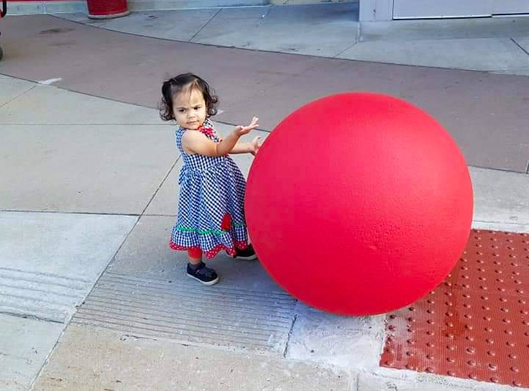 Anya joined the competition — help win amazing prizes! asphalt, baby, ball, beauty, child, floor, flooring, fun, human_leg, leisure, magenta, person, pink, recreation, road_surface, shoulder, sidewalk, sitting, standing, thigh