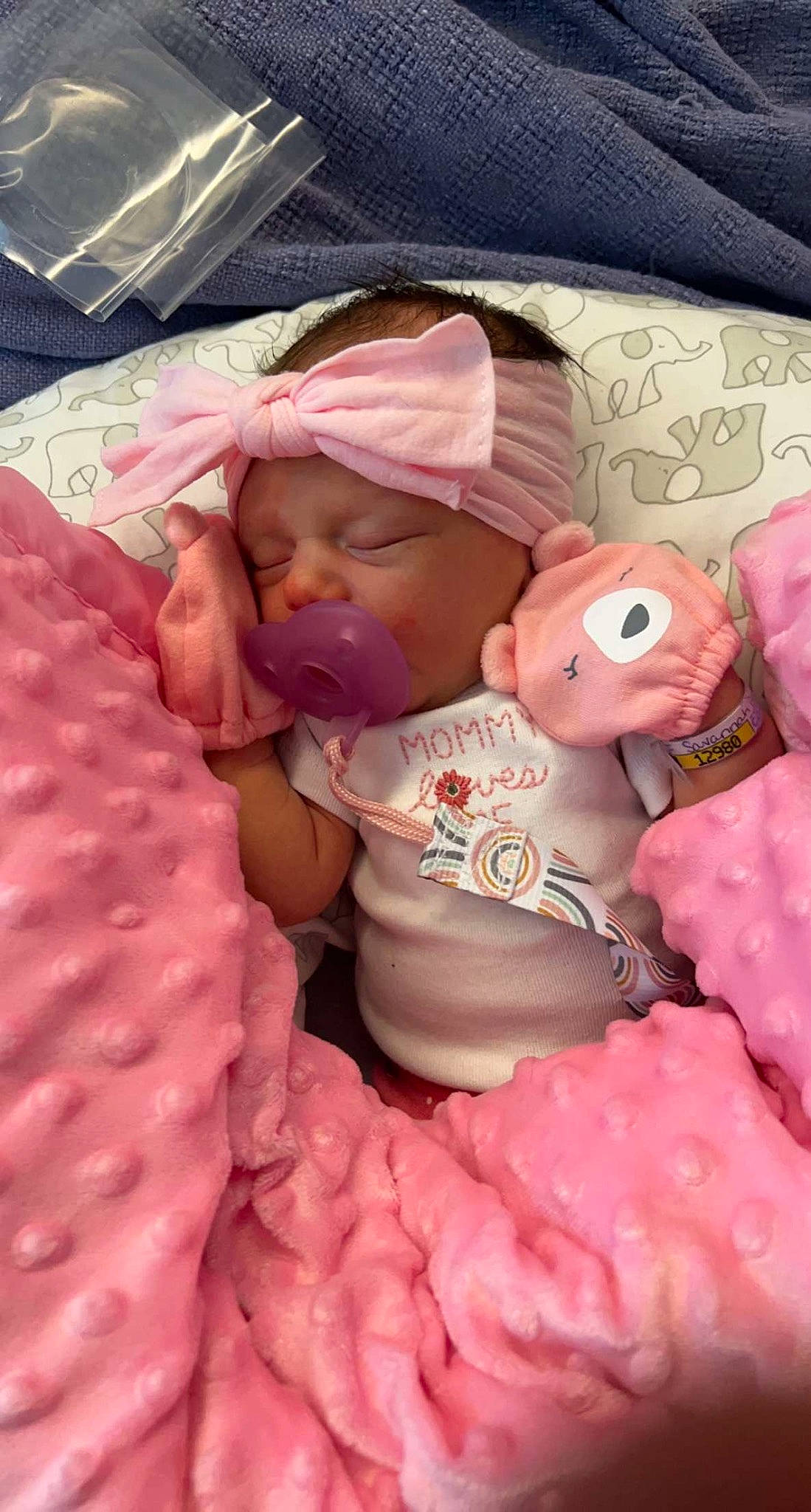 Lakelynn joined the competition — help win amazing prizes! abdomen, baby, baby_products, baby_sleeping, baby_toddler_clothing, bed_sheet, bedding, bedtime, cheek, child, comfort, linens, magenta, pattern, peach, person, pink, room, skin, toddler