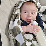 Leelynd is registered to the contest to win money with this photo: baby, bottle, blanket, child, cozy, feeding, happy, infant, milk, person, portrait, seat, smile, soft, toddler, warm, wrapped, young, cute, indoors