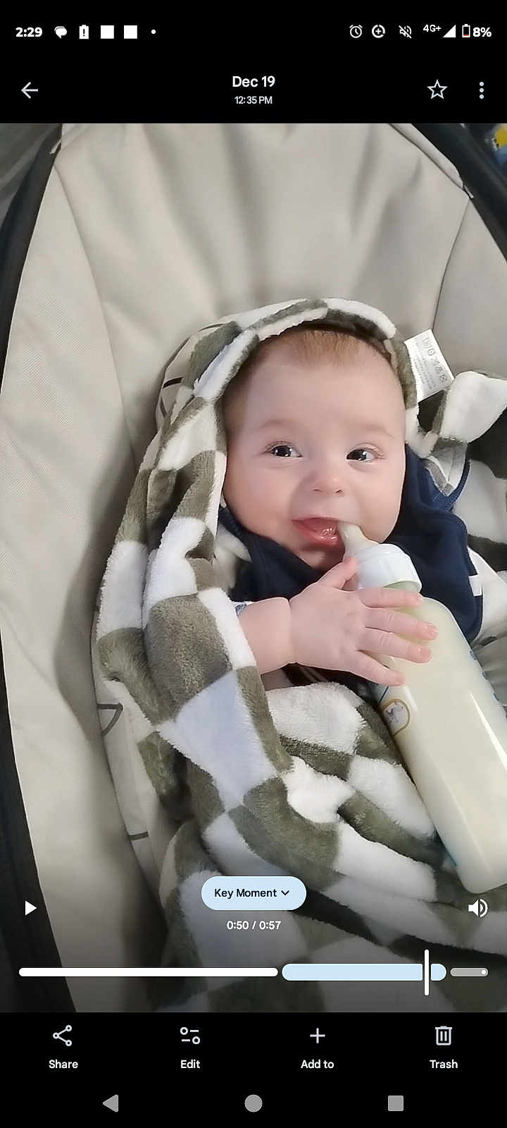Leelynd is registered to the contest to win money with this photo: baby, bottle, blanket, child, cozy, feeding, happy, infant, milk, person, portrait, seat, smile, soft, toddler, warm, wrapped, young, cute, indoors