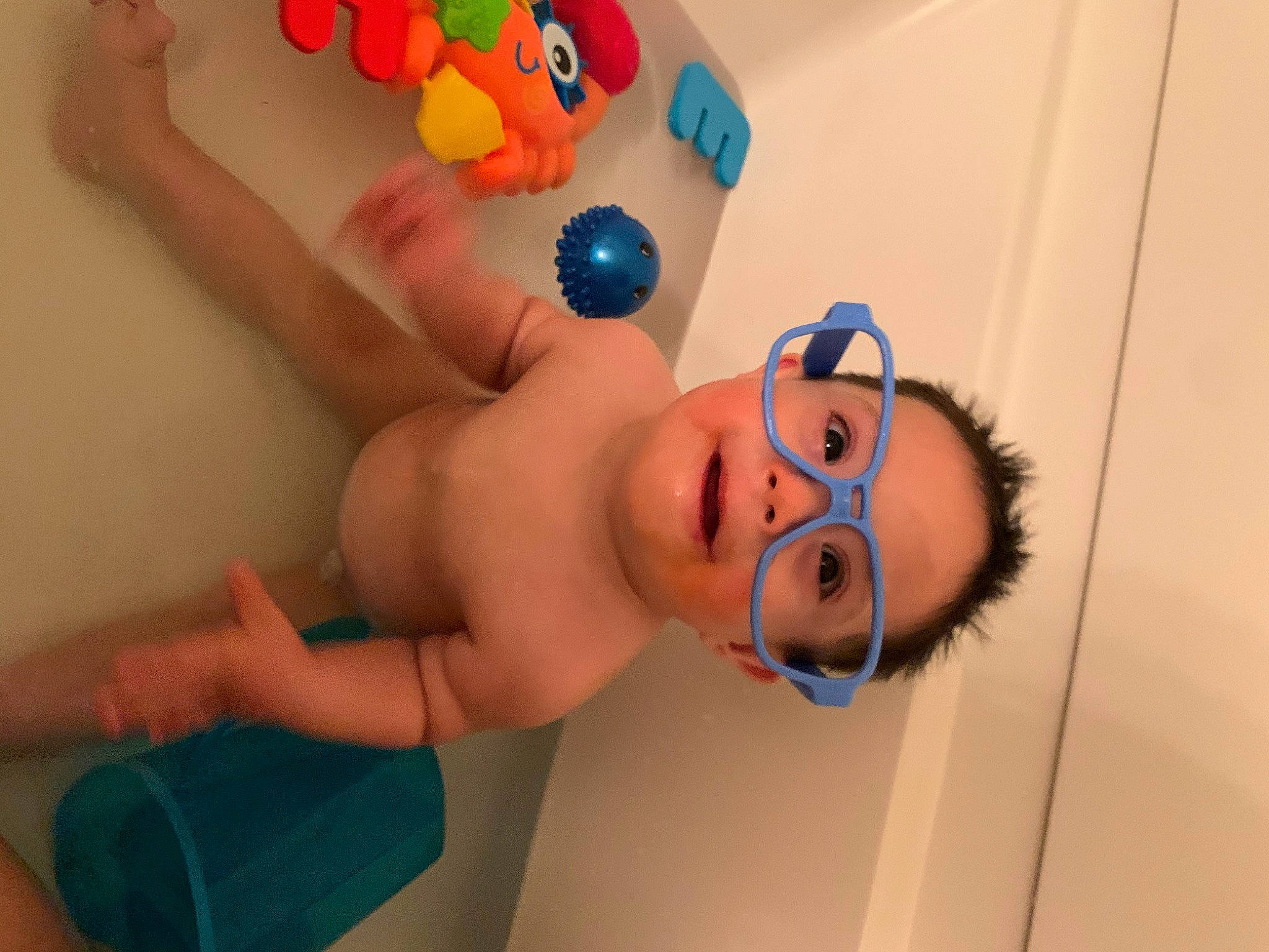 Harold is registered to the contest to win money with this photo: baby, balloon, bathing, child, fun, muscle, party_supply, person, room, toddler