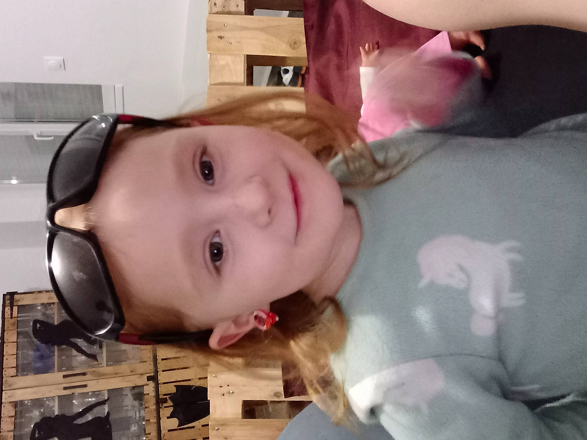 Cleo participe au concours pour gagner de l'argent avec cette photo : audio_equipment, baby, brown_hair, cheek, child, ear, eyelash, eyewear, fun, happy, headwear, jaw, joy, lip, mouth, nose, person, room, skin, smile