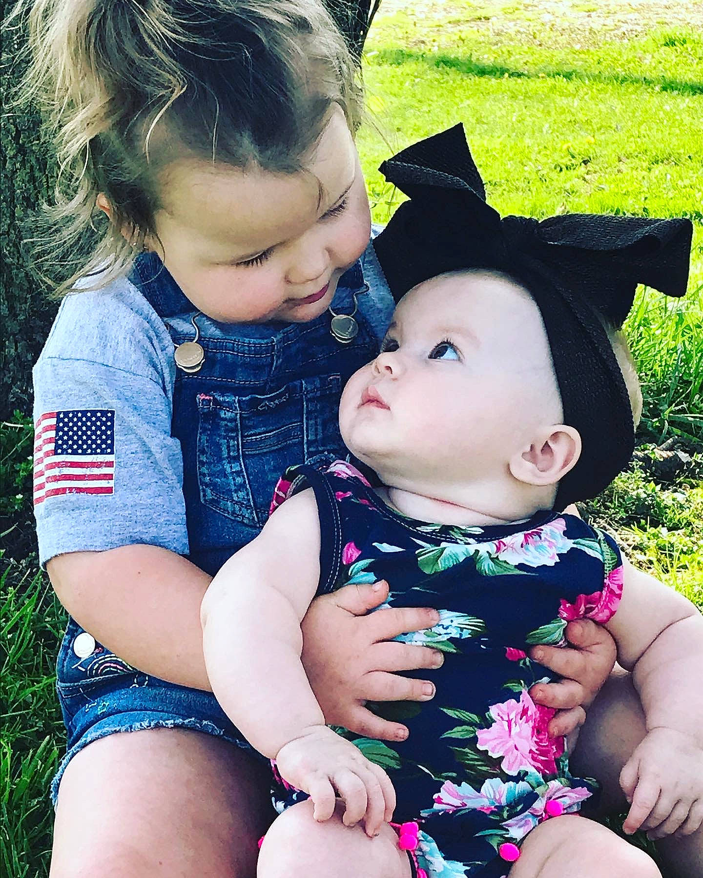 Kayzlee is registered to the contest to win money with this photo: baby, beauty, cheek, child, ear, eye, grass, hand, happy, interaction, leg, lip, love, people, person, pink, product, skin, spring, summer