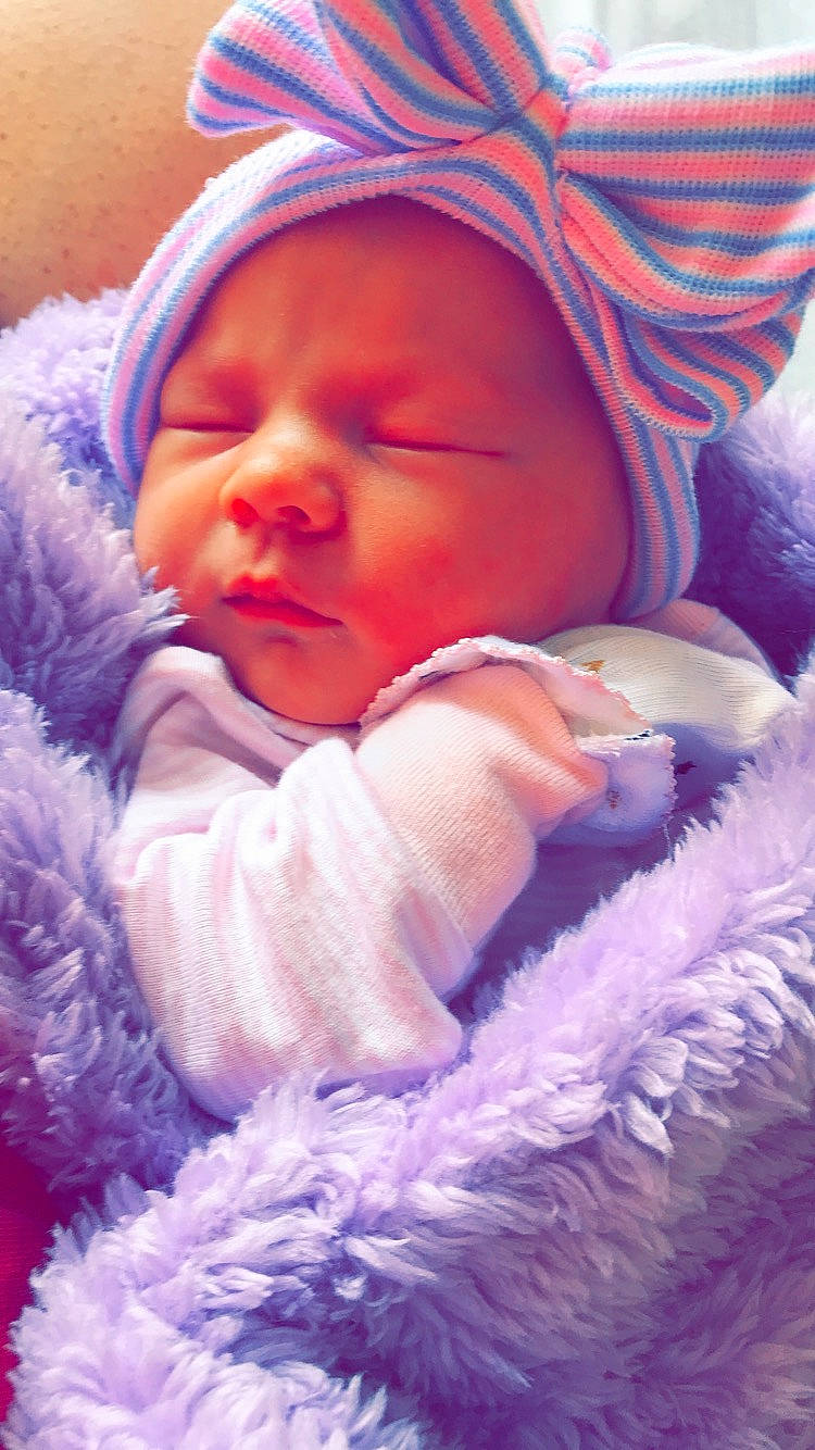 Kayzlee is registered to the contest to win money with this photo: baby, baby_products, cheek, child, eye, face, fur, head, headgear, headwear, lavender, lilac, nose, person, photography, pink, product, purple, skin, sleep