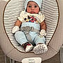 baby, infant, baby_rocker, mickey_mouse, clothing, mittens, hat, shoes, striped, seat_belt, baby_seat, floor, graco, cute, wide_eyes, indoor, toddler, person, child, portrait