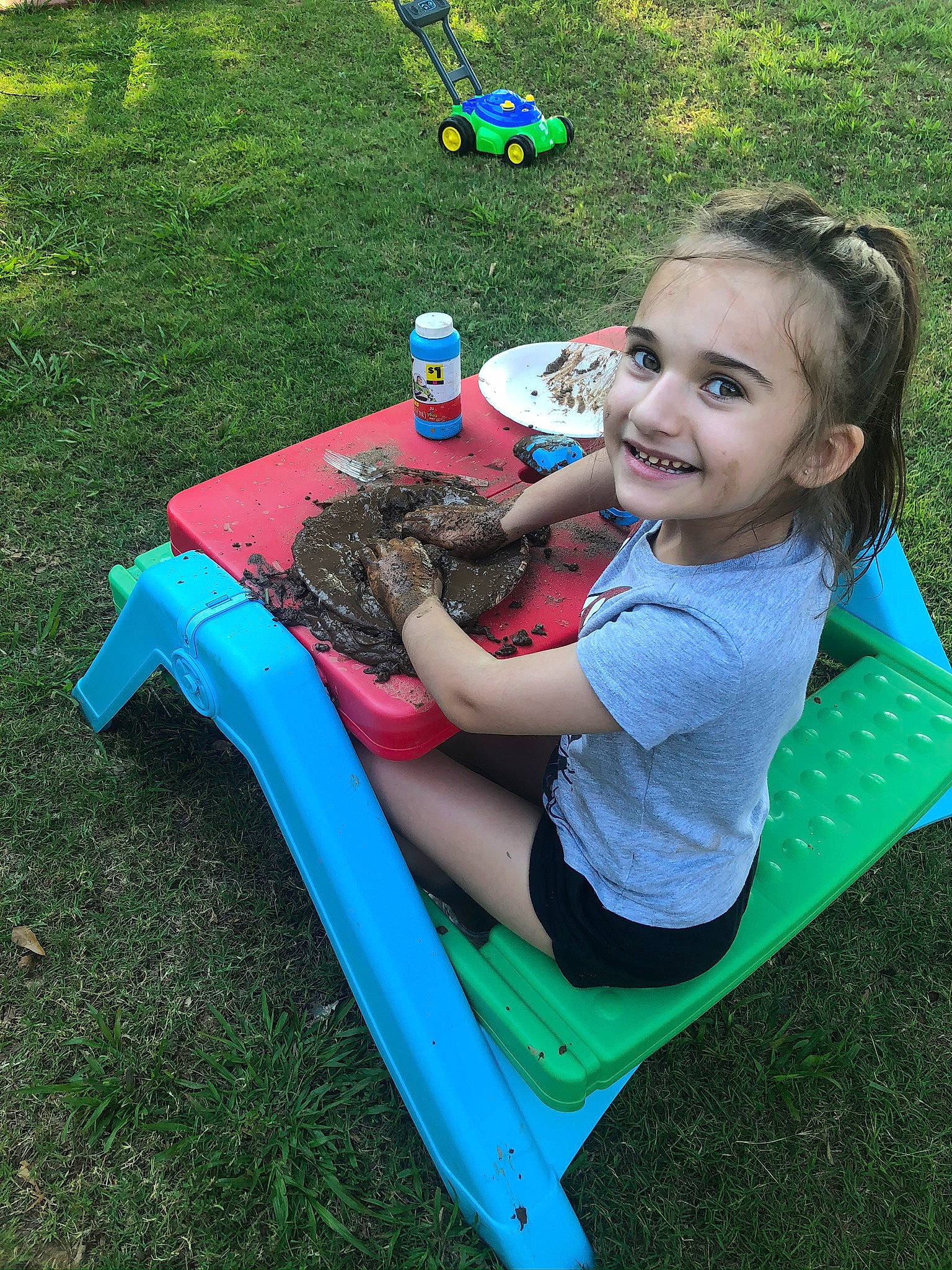 Bryleigh is registered to the contest to win money with this photo: baby_products, baby_toddler_clothing, baby_toys, child, joy, lap, lawn, majorelle_blue, outdoor_furniture, person, plastic, play, playground, playground_slide, sharing, toddler, toy, yard