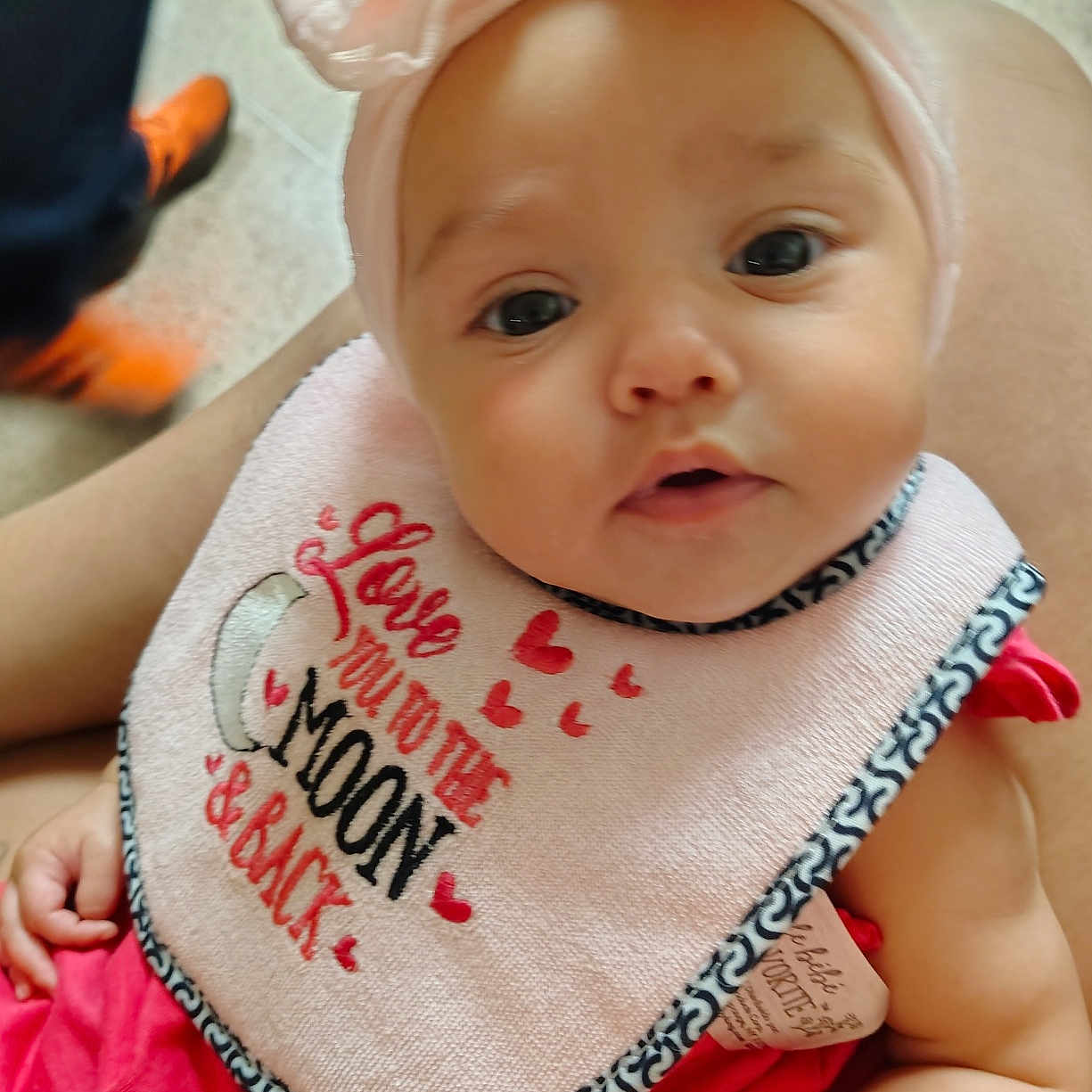 La'Veaha is registered to the contest to win money with this photo: accessories, baby, bib, bonnet, boy, child, clothing, cushion, face, footwear, hat, head, headband, male, newborn, person, photography, portrait, shoe, sitting