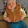 baby, infant, child, sleeping, drool, headband, bow, sherpa_vest, vest, jeans, heart_pattern, hands, couch, pillow, blanket, cozy, portrait, indoor, cute, nap