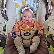 Joy participe au concours pour gagner de l'argent avec cette photo : baby, infant, child, stroller, baby_seat, headband, smile, adorable, clothing, socks, pacifier, harness, toy, tile_floor, indoor, cute, hair, happy, portrait, sitting