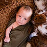 baby, brown_blanket, child, closeup, comfort, cozy, cute, face, furry, hand, indoor, infant, knitted_blanket, plush_toy, portrait, resting, skin, sleepy, soft_texture, swaddle
