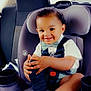 Thomas joined the competition — help win amazing prizes! toddler, child, car_seat, smiling, bow_tie, shoe, black_shoes, curly_hair, car_interior, seatbelt, happy, cute, sitting, baby, clothing, infant, safety_seat, hands, portrait, young_child