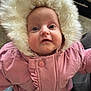Arabella joined the competition — help win amazing prizes! baby, child, pink_coat, fur_hood, winter_clothing, face, blue_eyes, curious_expression, indoor, closeup, cute, warm, soft_texture, portrait, small_person, adorable, jacket, infant, apparel, human