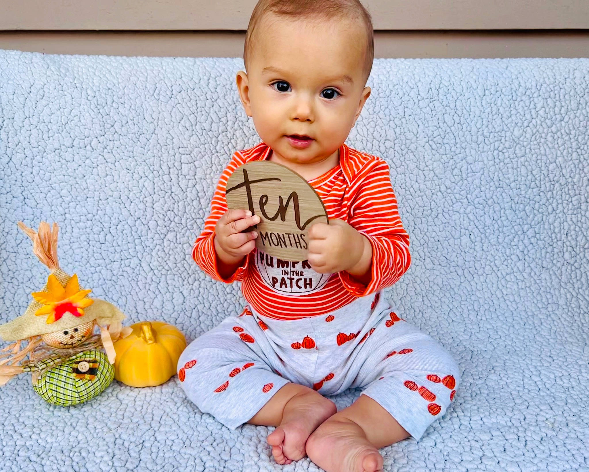 Noah joined the competition — help win amazing prizes! baby, baby_toddler_clothing, calabaza, child, flooring, gourd, happy, head, human_body, human_leg, knee, natural_foods, orange, person, photograph, pumpkin, sleeve, t_shirt, thigh, toddler