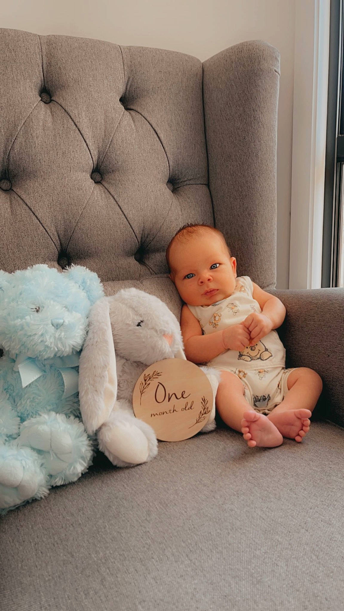 Cohen joined the competition — help win amazing prizes! baby, baby_sleeping, baby_toddler_clothing, child, comfort, couch, flooring, foot, human_leg, leg, linens, person, product, room, sitting, teddy_bear, textile, thigh, toddler, toy